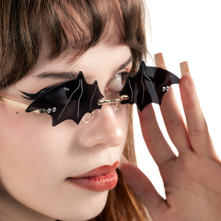 Shop Bat Shades from Forbidden Alchemy's gothic sunglasses. Premium quality eyewear featuring bold frames and authentic goth aesthetics. Tagged: shades.Sunglassesforbidden alchemyshades