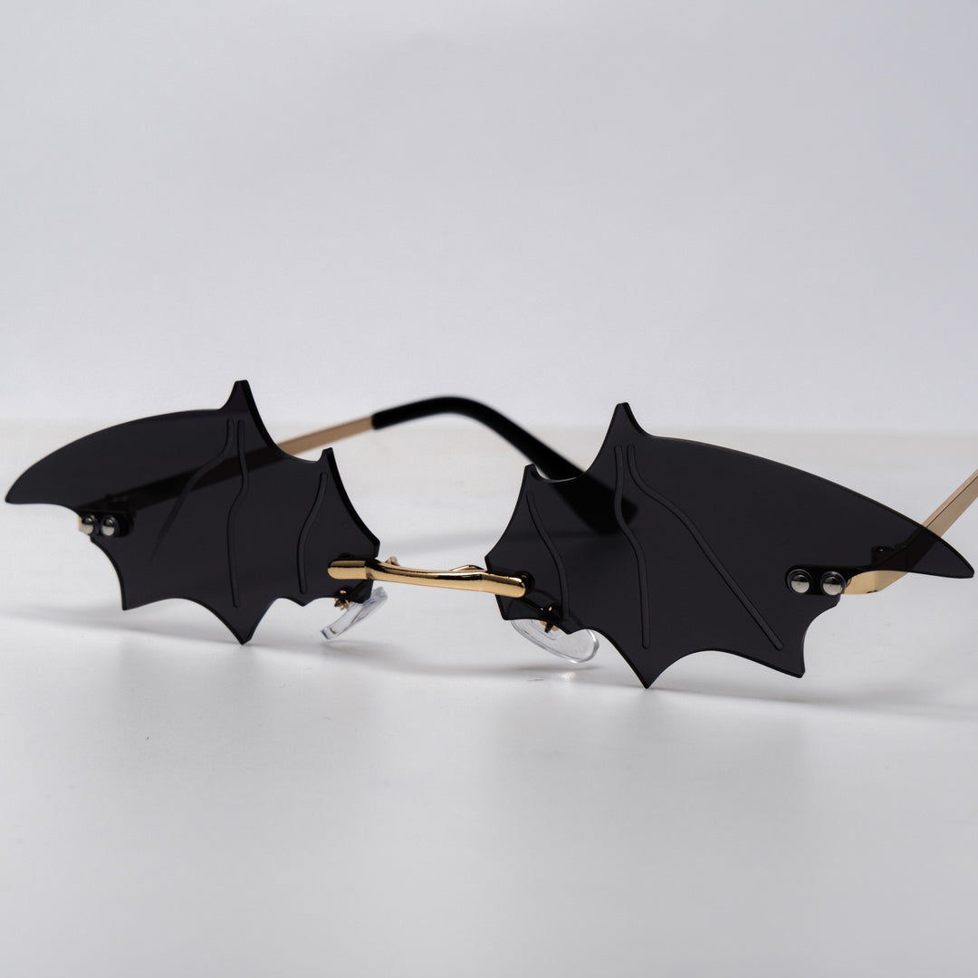 Shop Bat Shades from Forbidden Alchemy's gothic sunglasses. Premium quality eyewear featuring bold frames and authentic goth aesthetics. Tagged: shades.Sunglassesforbidden alchemyshades