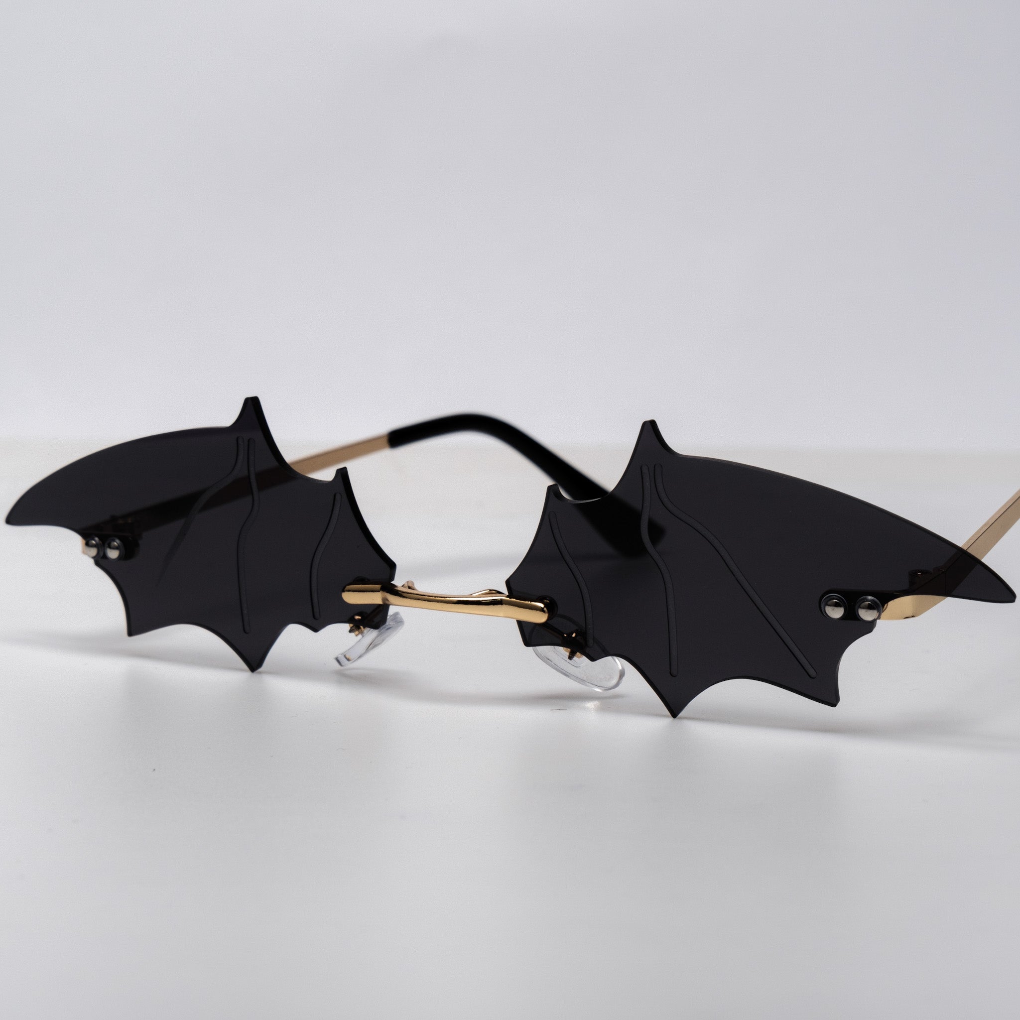Shop Bat Shades from Forbidden Alchemy's gothic sunglasses. Premium quality eyewear featuring bold frames and authentic goth aesthetics. Tagged: shades.Sunglassesforbidden alchemyshades