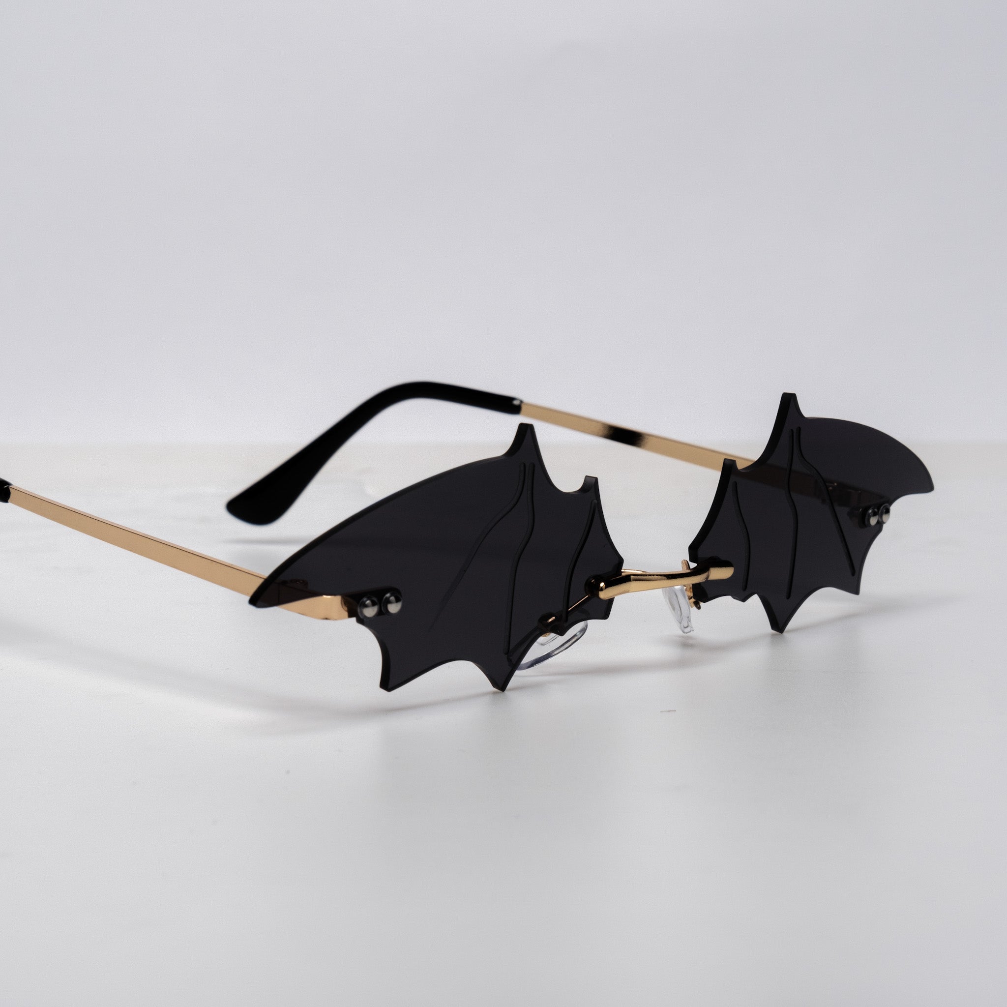 Shop Bat Shades from Forbidden Alchemy's gothic sunglasses. Premium quality eyewear featuring bold frames and authentic goth aesthetics. Tagged: shades.Sunglassesforbidden alchemyshades