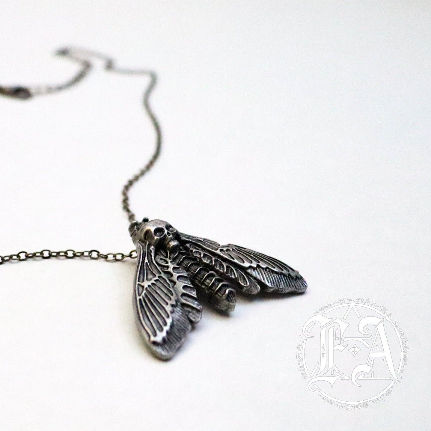 Shop Death Moth - Necklace from Forbidden Alchemy’s collection. Crafted from premium alloy zinc, each piece showcases detailed. Tagged: Necklaces.Necklacesforbidden alchemyNecklaces