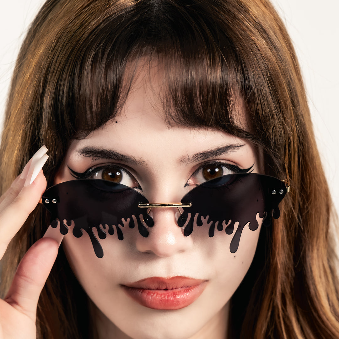 Shop Drip Shades from Forbidden Alchemy's gothic sunglasses. Premium quality eyewear featuring bold frames and authentic goth aesthetics. Tagged: shades.Sunglassesforbidden alchemyshades