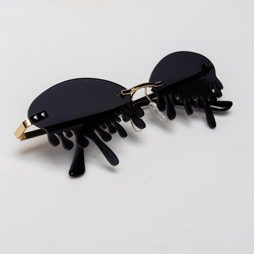 Shop Drip Shades from Forbidden Alchemy's gothic sunglasses. Premium quality eyewear featuring bold frames and authentic goth aesthetics. Tagged: shades.Sunglassesforbidden alchemyshades