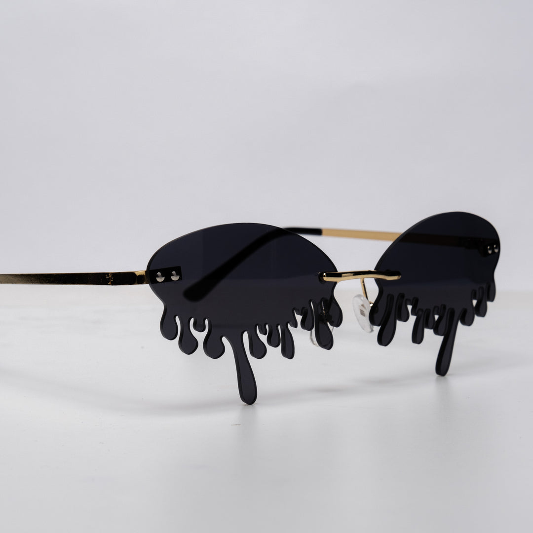 Shop Drip Shades from Forbidden Alchemy's gothic sunglasses. Premium quality eyewear featuring bold frames and authentic goth aesthetics. Tagged: shades.Sunglassesforbidden alchemyshades