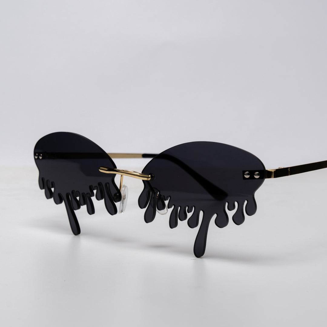 Shop Drip Shades from Forbidden Alchemy's gothic sunglasses. Premium quality eyewear featuring bold frames and authentic goth aesthetics. Tagged: shades.Sunglassesforbidden alchemyshades