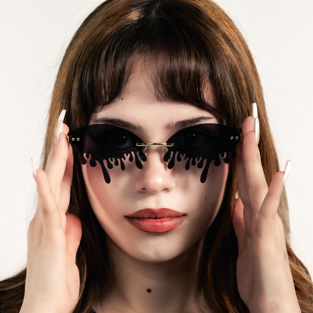 Shop Drip Shades from Forbidden Alchemy's gothic sunglasses. Premium quality eyewear featuring bold frames and authentic goth aesthetics. Tagged: shades.Sunglassesforbidden alchemyshades