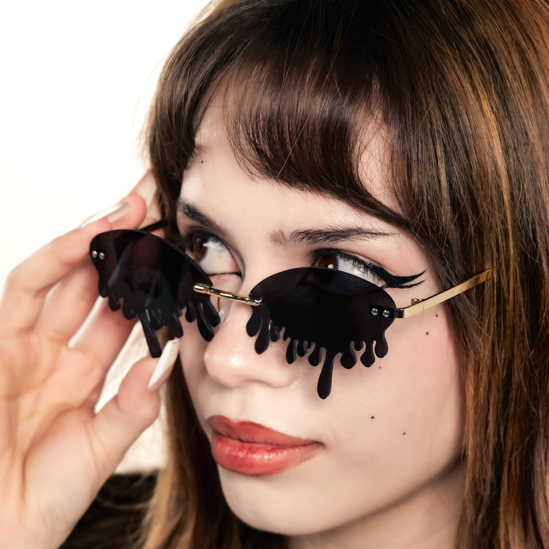 Shop Drip Shades from Forbidden Alchemy's gothic sunglasses. Premium quality eyewear featuring bold frames and authentic goth aesthetics. Tagged: shades.Sunglassesforbidden alchemyshades