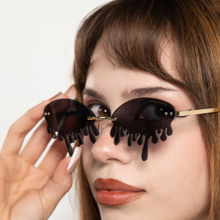Shop Drip Shades from Forbidden Alchemy's gothic sunglasses. Premium quality eyewear featuring bold frames and authentic goth aesthetics. Tagged: shades.Sunglassesforbidden alchemyshades