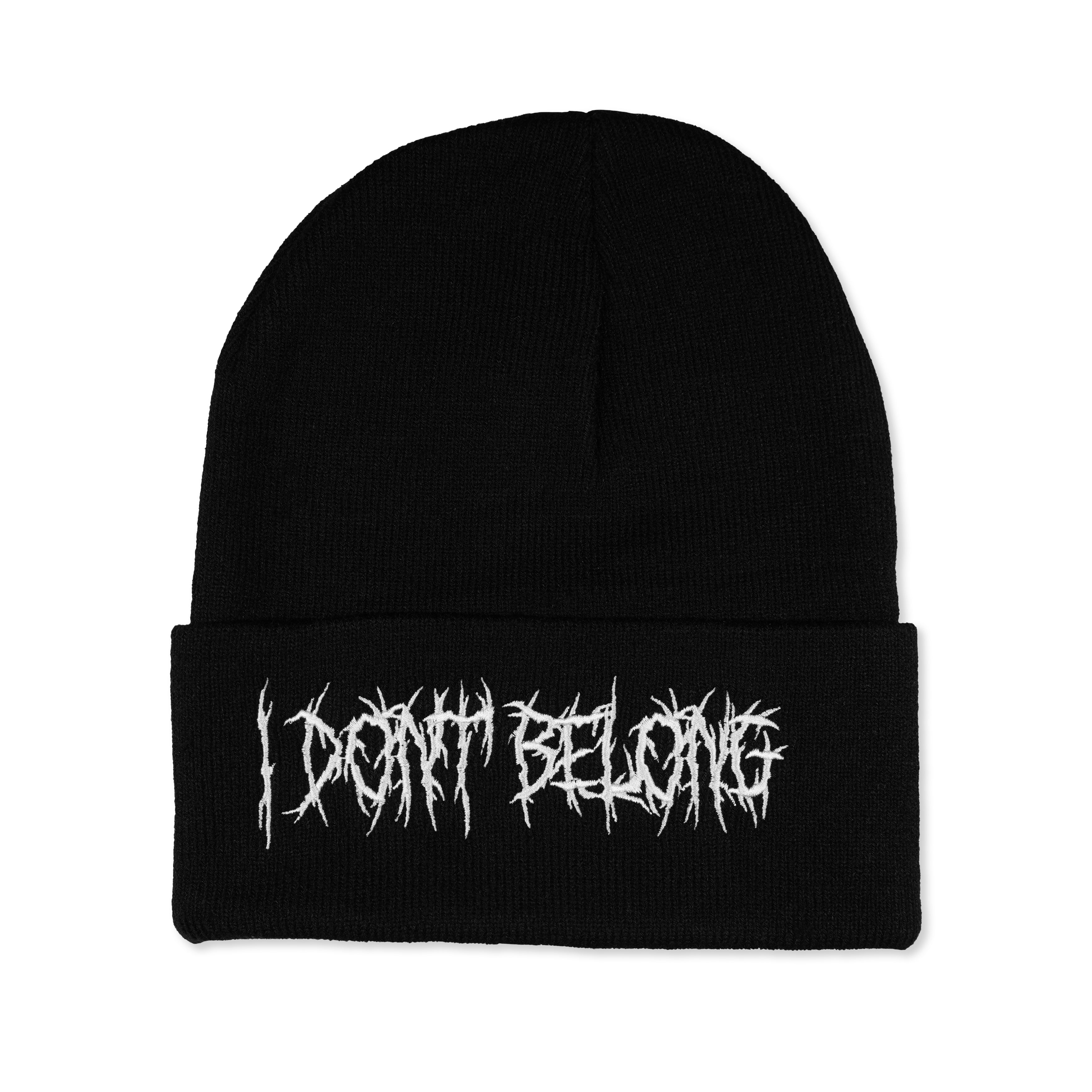 I Dont Belong beanie with bold white embroidery on black knit fabric.