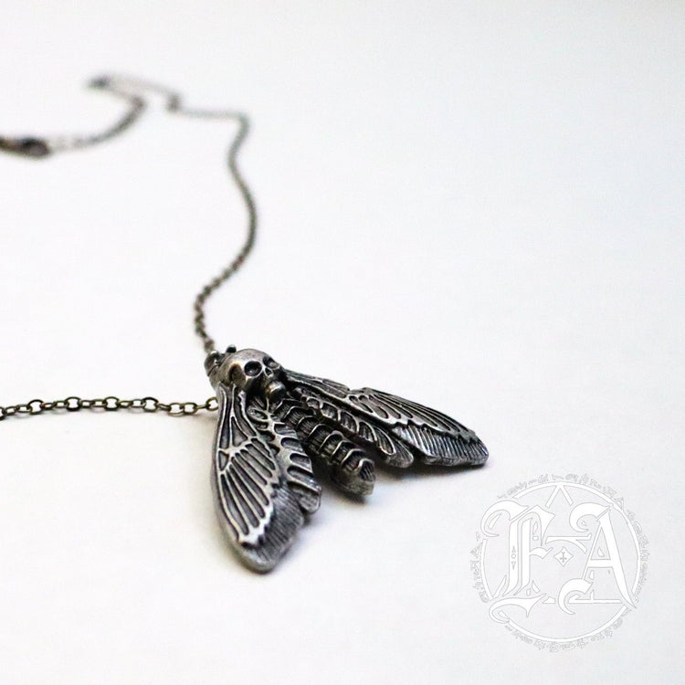 Shop Death Moth - Necklace from Forbidden Alchemy’s collection. Crafted from premium alloy zinc, each piece showcases detailed. Tagged: Necklaces.Necklacesforbidden alchemyNecklaces